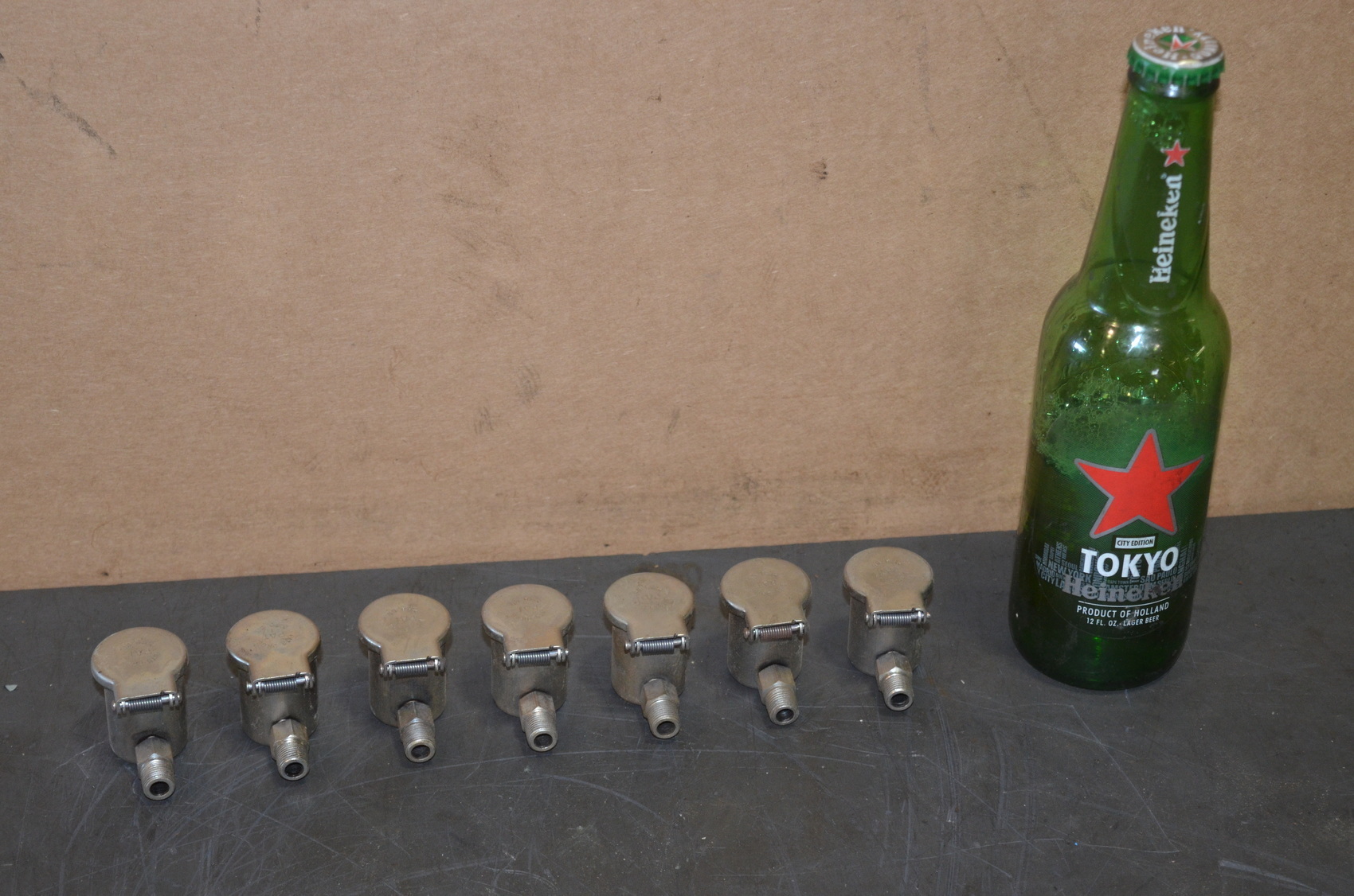 NEW lot of 7 Bits bros pat machine oilers;1/8 BSPT