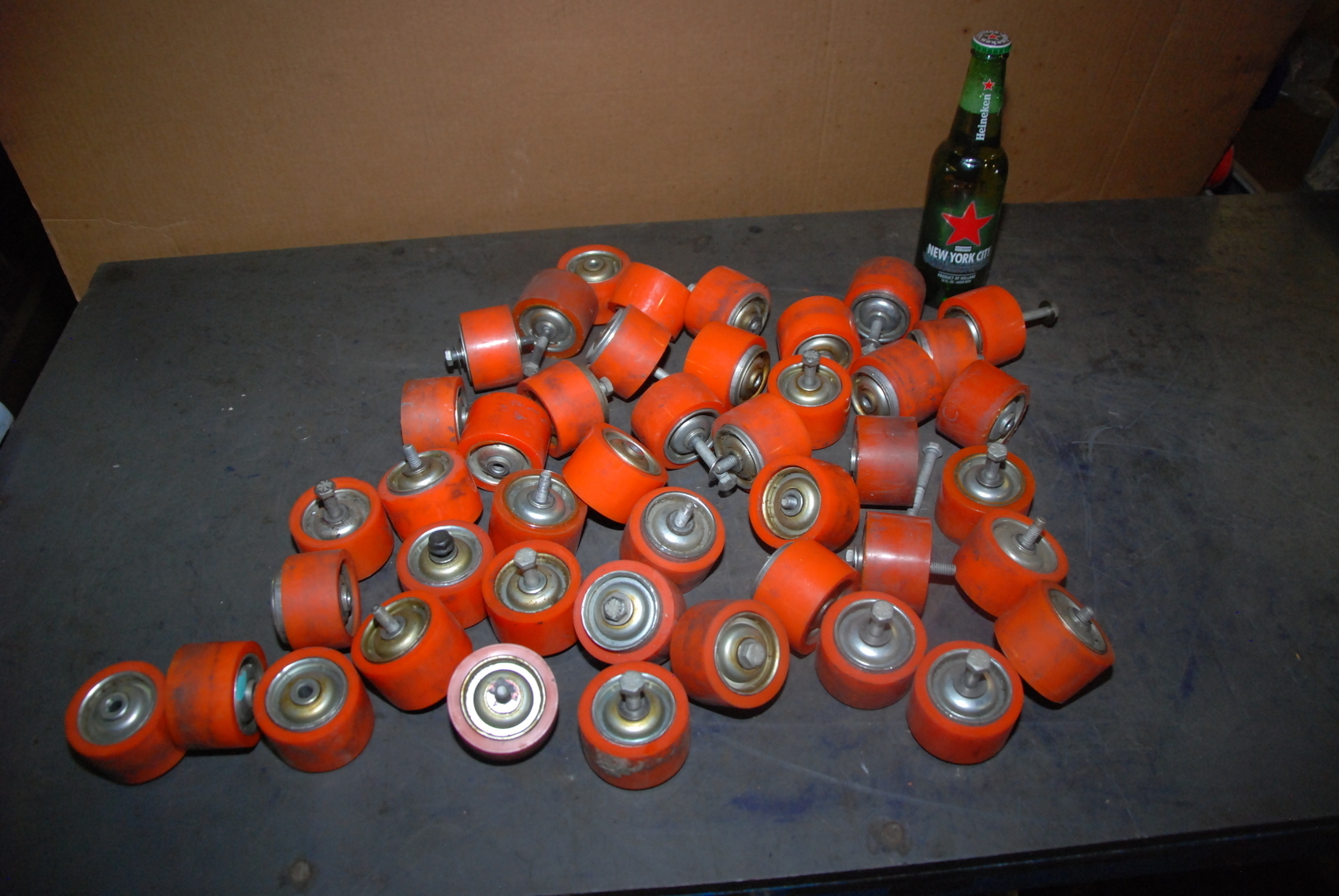 Lot of 44 PEER T-5799 urethane rubber conveyor feed rollers